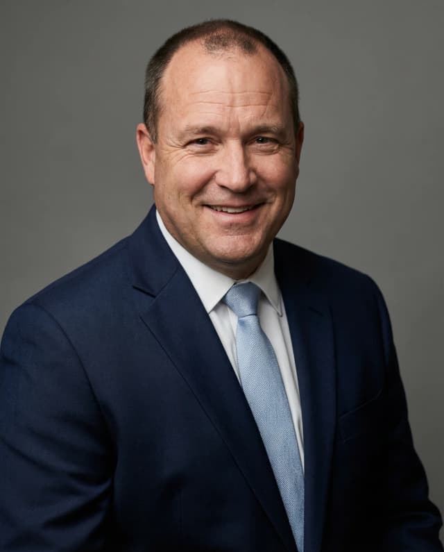 Professional AI-generated headshot example 12